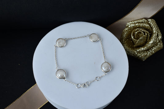 Coin pearl station bracelet with bezel-set pearls on a 925 silver chain