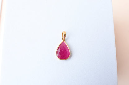 18K gold pendant with bezel-set rose-cut pear ruby