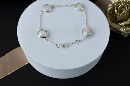 Coin pearl station bracelet with bezel-set pearls on a 925 silver chain