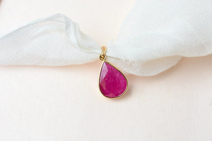 18K gold pendant with bezel-set rose-cut pear ruby