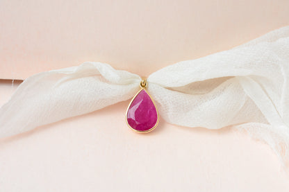 18K gold pendant with bezel-set rose-cut pear ruby