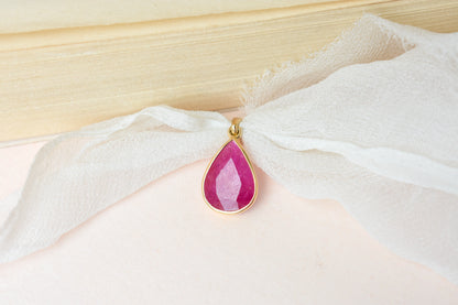 18K gold pendant with bezel-set rose-cut pear ruby