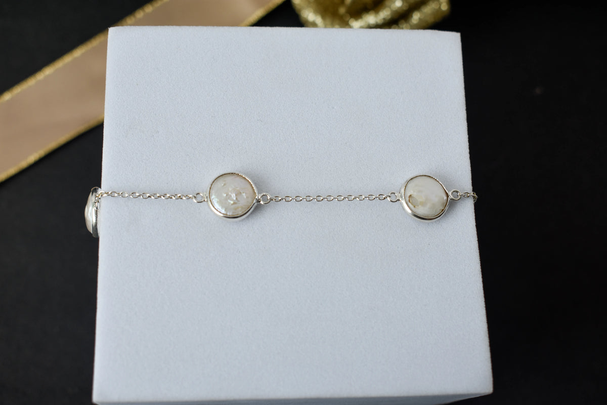 Coin pearl station bracelet with bezel-set pearls on a 925 silver chain