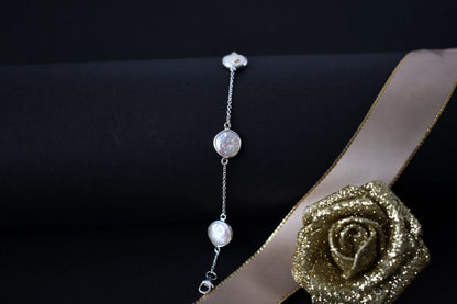 Coin pearl station bracelet with bezel-set pearls on a 925 silver chain