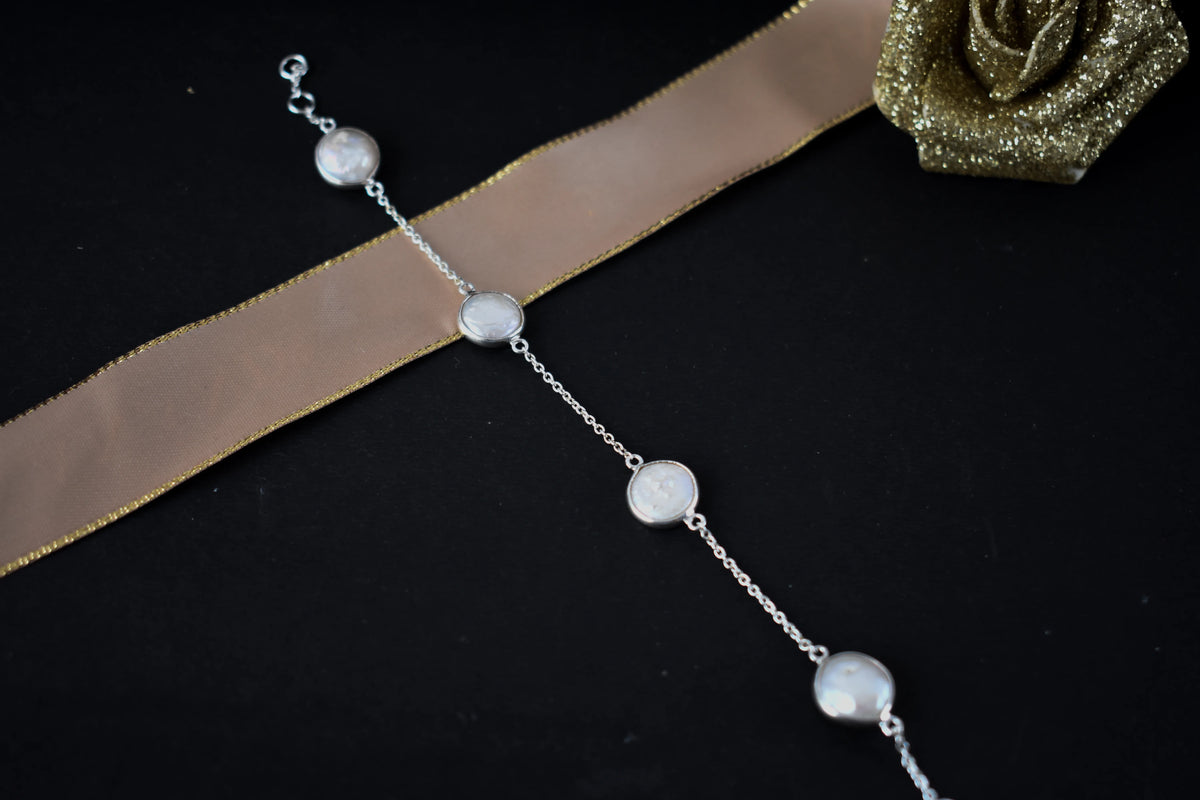 Coin pearl station bracelet with bezel-set pearls on a 925 silver chain