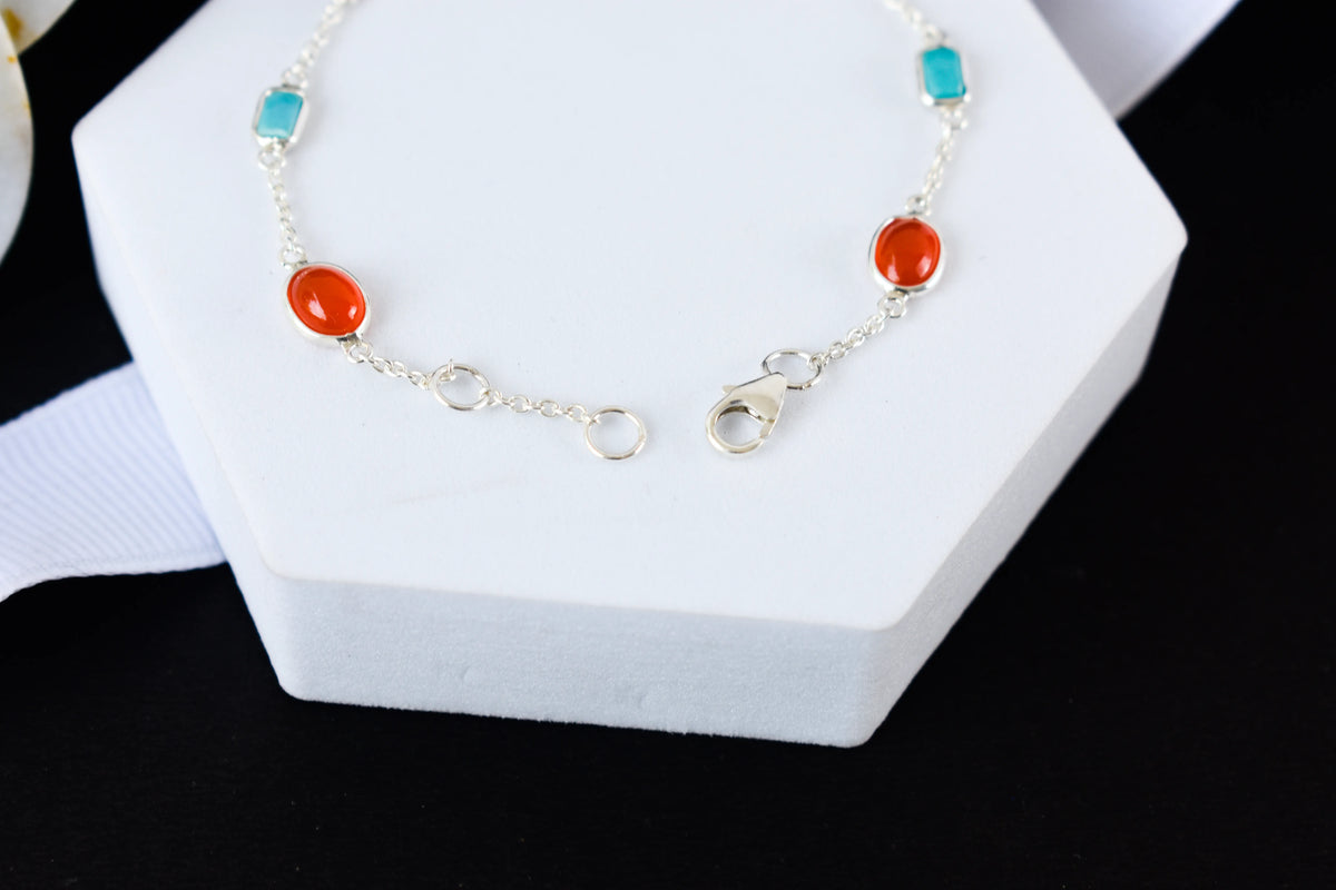 925 silver bracelet with bezel-set carnelian and turquoise cabochons and lobster clasp