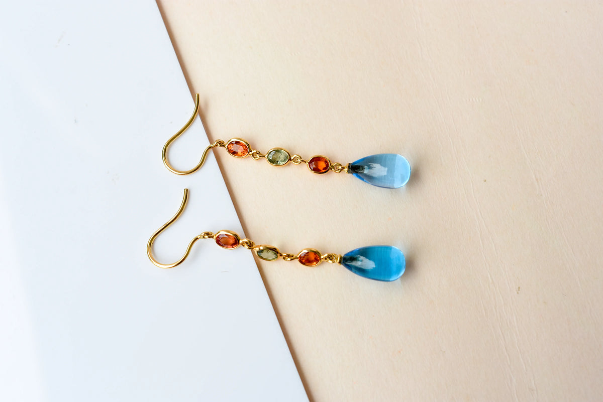 18K gold chain drop earrings with sapphire and blue topaz briolette