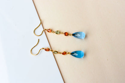 18K gold chain drop earrings with sapphire and blue topaz briolette