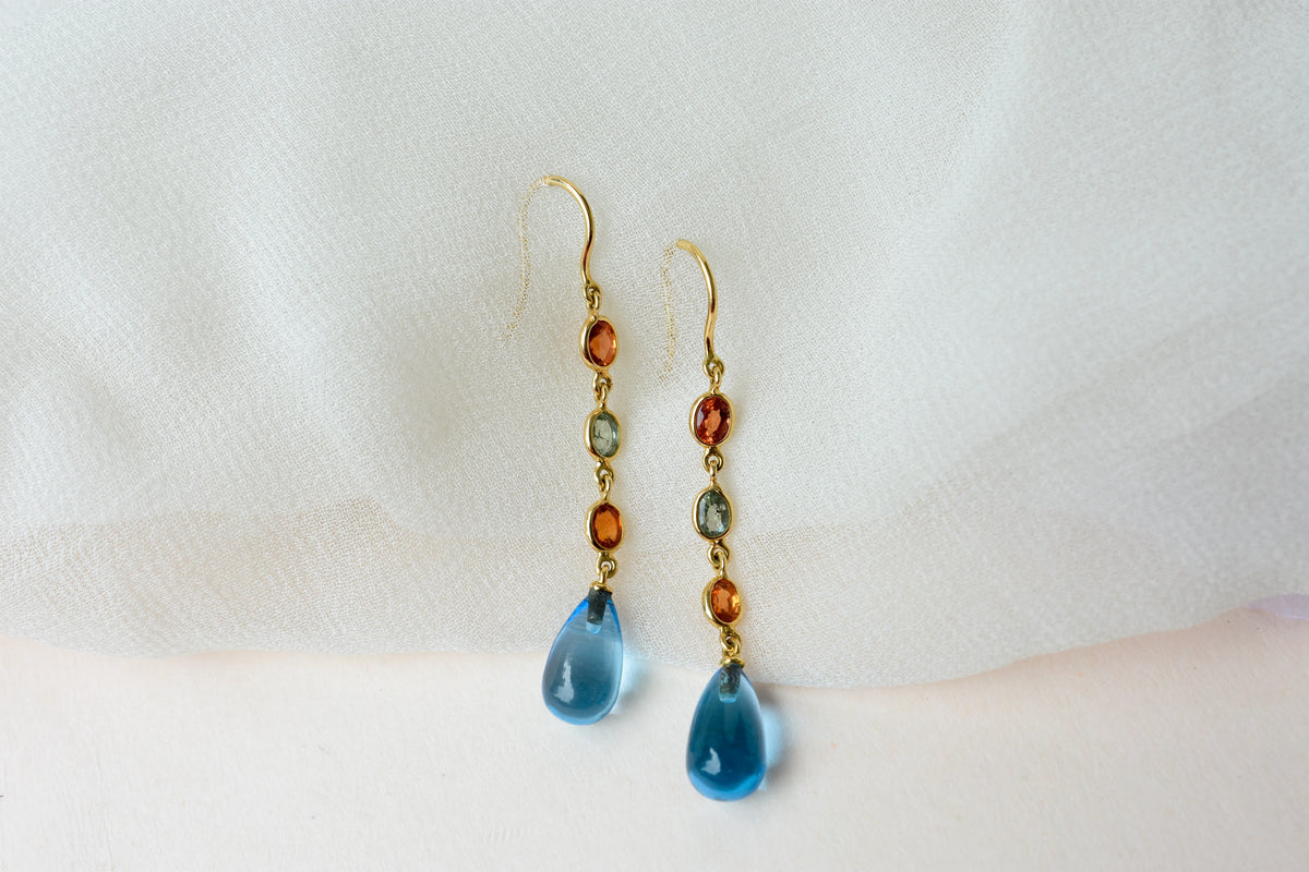 18K gold chain drop earrings with sapphire and blue topaz briolette
