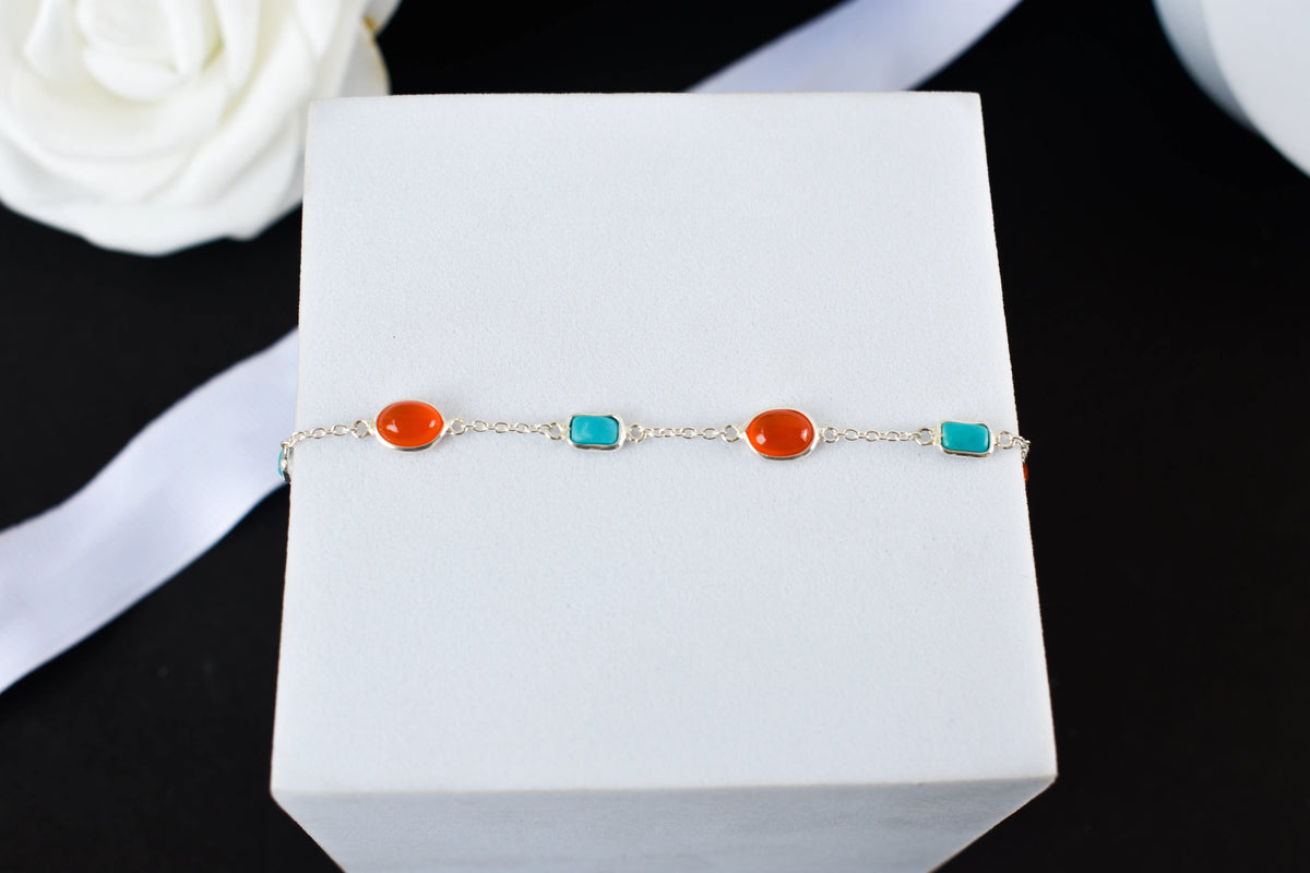 925 silver bracelet with bezel-set carnelian and turquoise cabochons and lobster clasp