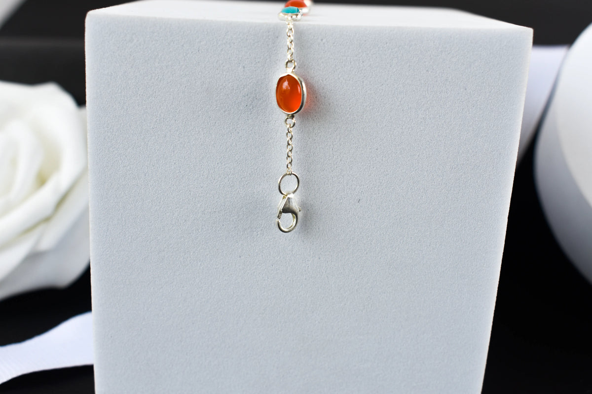 925 silver bracelet with bezel-set carnelian and turquoise cabochons and lobster clasp