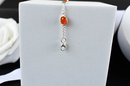 925 silver bracelet with bezel-set carnelian and turquoise cabochons and lobster clasp
