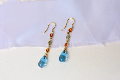 18K gold chain drop earrings with sapphire and blue topaz briolette