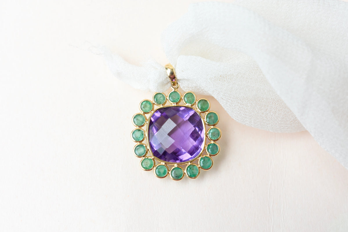 18K gold pendant with checkerboard amethyst and emerald cabochon halo