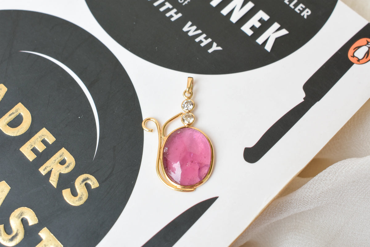18K gold pendant with cabochon pink tourmaline and diamond accents