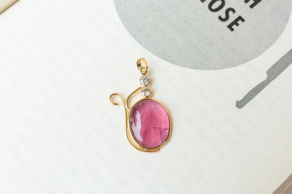 18K gold pendant with cabochon pink tourmaline and diamond accents