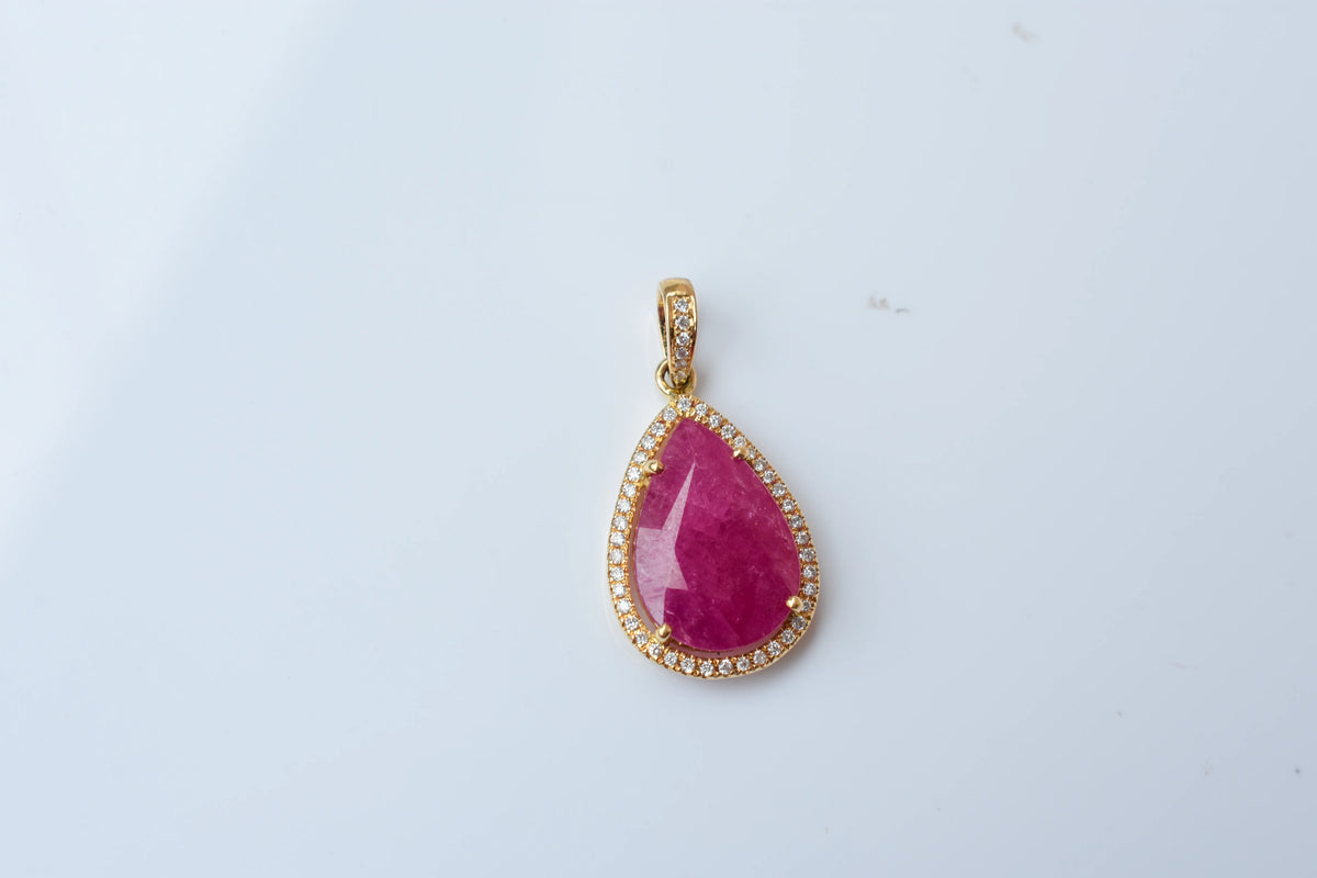 18K gold pendant with large rose-cut pear ruby and diamond halo