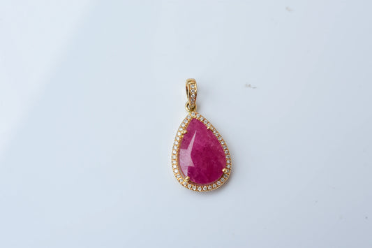 18K gold pendant with large rose-cut pear ruby and diamond halo