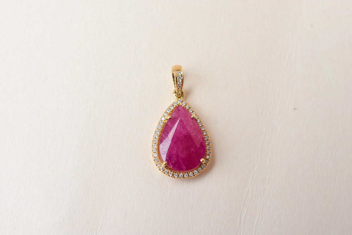 18K gold pendant with large rose-cut pear ruby and diamond halo