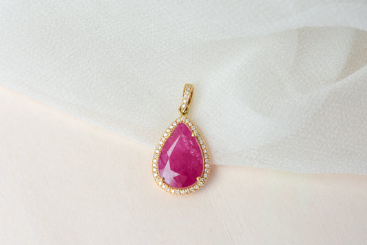 18K gold pendant with large rose-cut pear ruby and diamond halo