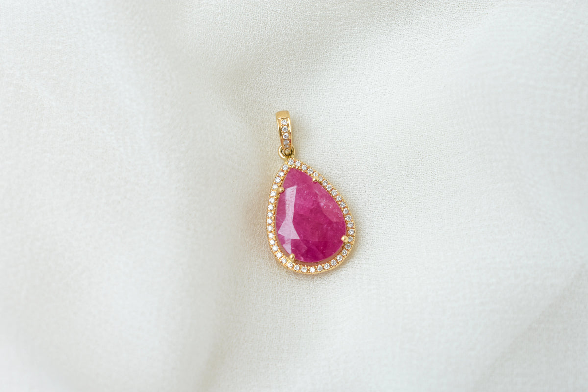 18K gold pendant with large rose-cut pear ruby and diamond halo