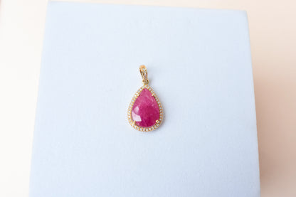 18K gold pendant with large rose-cut pear ruby and diamond halo