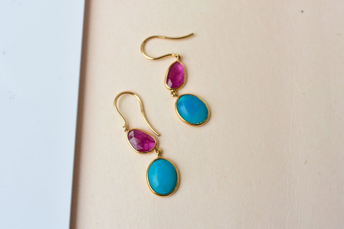 18K gold earrings with a rose quartz gemstone