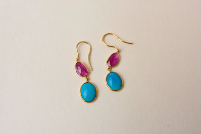 18K gold earrings with a rose quartz gemstone