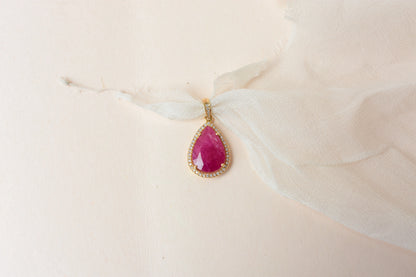 18K gold pendant with large rose-cut pear ruby and diamond halo