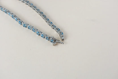 Swiss Blue Topaz tennis bracelet in 925 silver with cubic zirconia