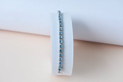 Swiss Blue Topaz tennis bracelet in 925 silver with cubic zirconia