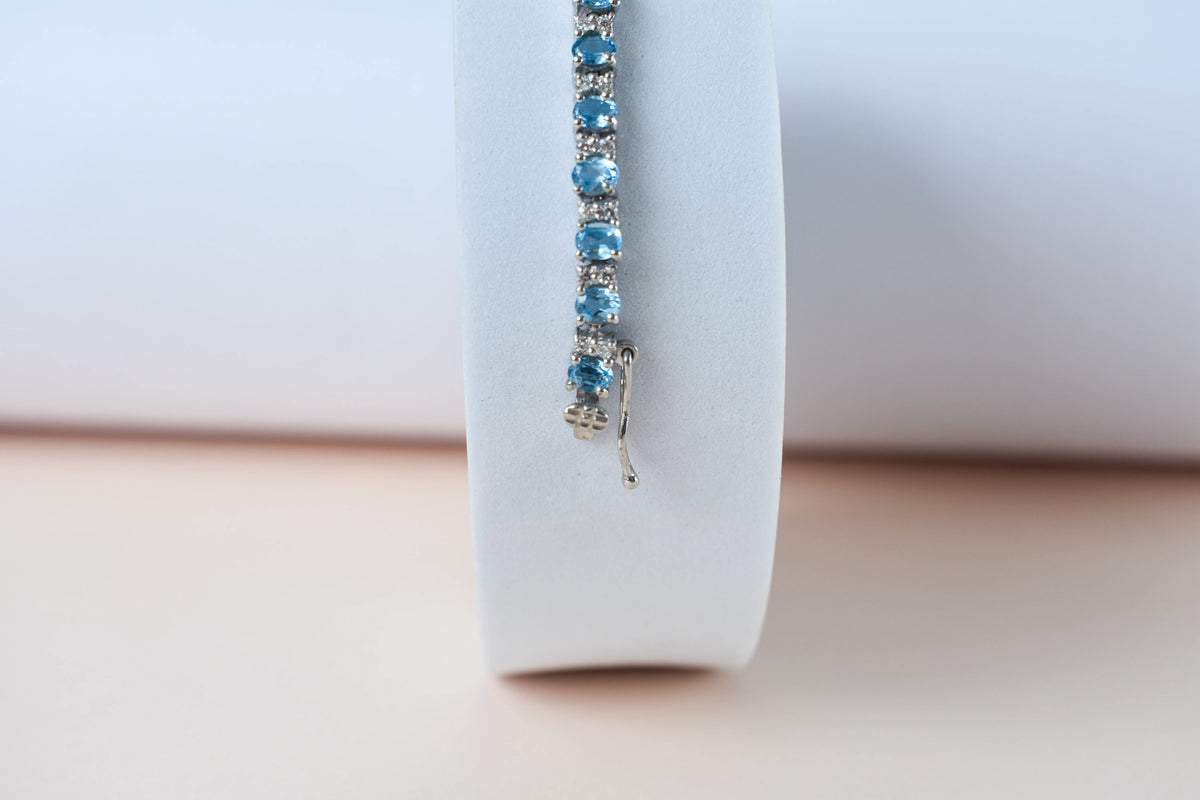 Swiss Blue Topaz tennis bracelet in 925 silver with cubic zirconia