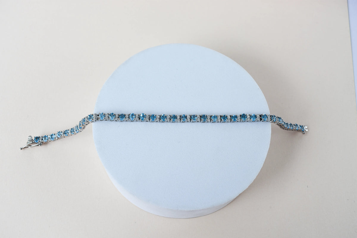 Swiss Blue Topaz tennis bracelet in 925 silver with cubic zirconia