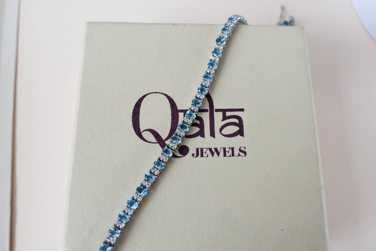 Swiss Blue Topaz tennis bracelet in 925 silver with cubic zirconia