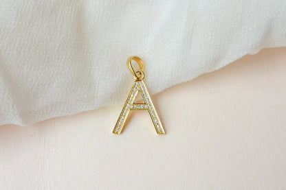 18K gold pendant with diamond pavé letter A