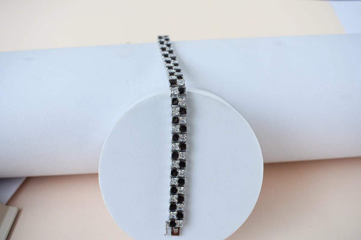 Black and white checkerboard tennis bracelet in silver