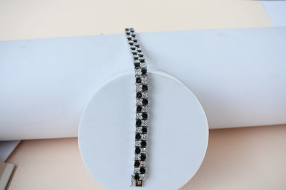 Black and white checkerboard tennis bracelet in silver