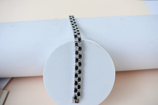 Black and white checkerboard tennis bracelet in silver