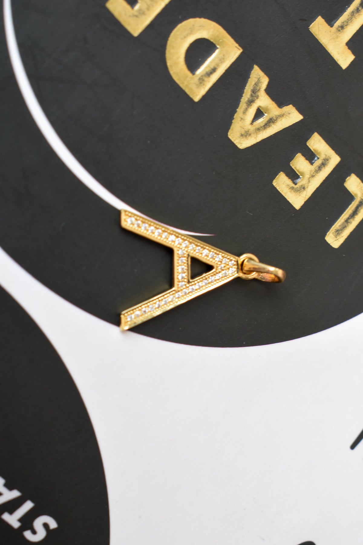 18K gold pendant with diamond pavé letter A
