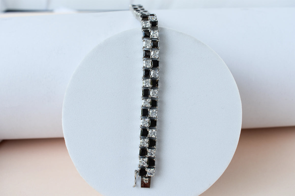 Black and white checkerboard tennis bracelet in silver
