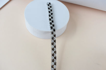 Black and white checkerboard tennis bracelet in silver