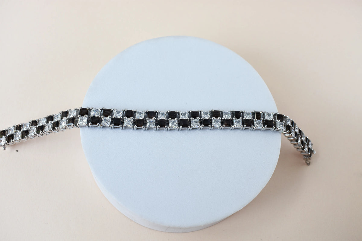 Black and white checkerboard tennis bracelet in silver