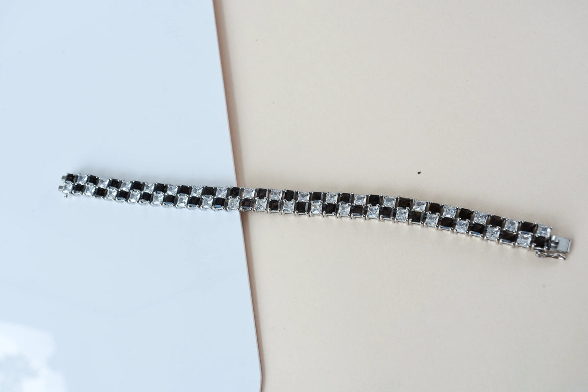 Black and white checkerboard tennis bracelet in silver