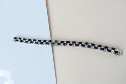 Black and white checkerboard tennis bracelet in silver