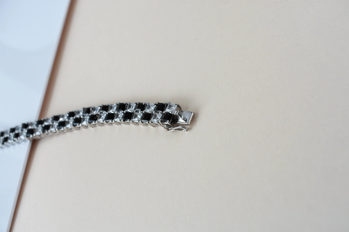 Black and white checkerboard tennis bracelet in silver
