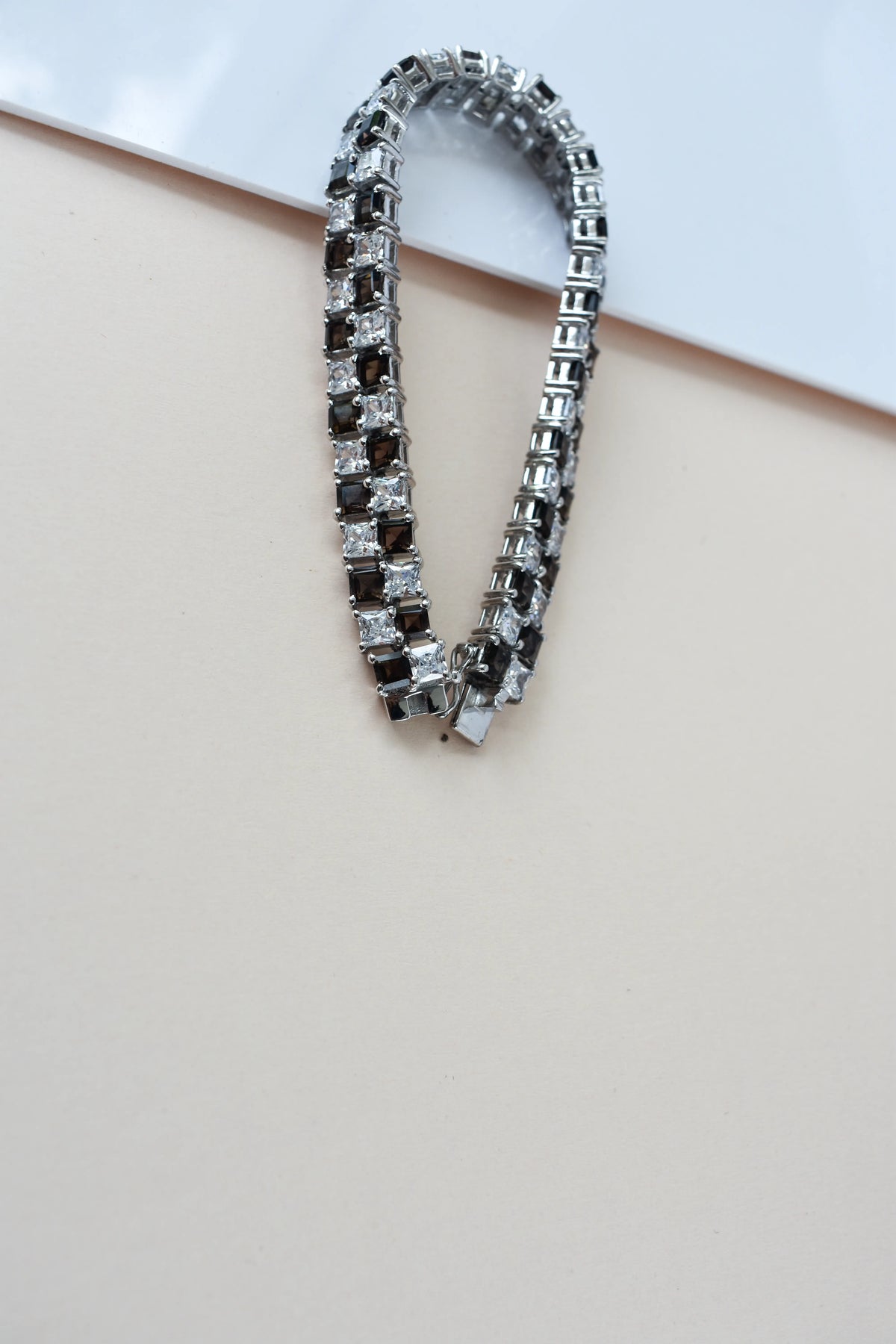 Black and white checkerboard tennis bracelet in silver