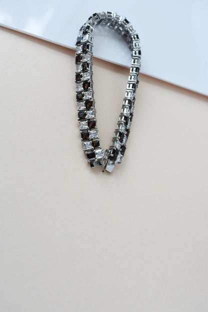 Black and white checkerboard tennis bracelet in silver