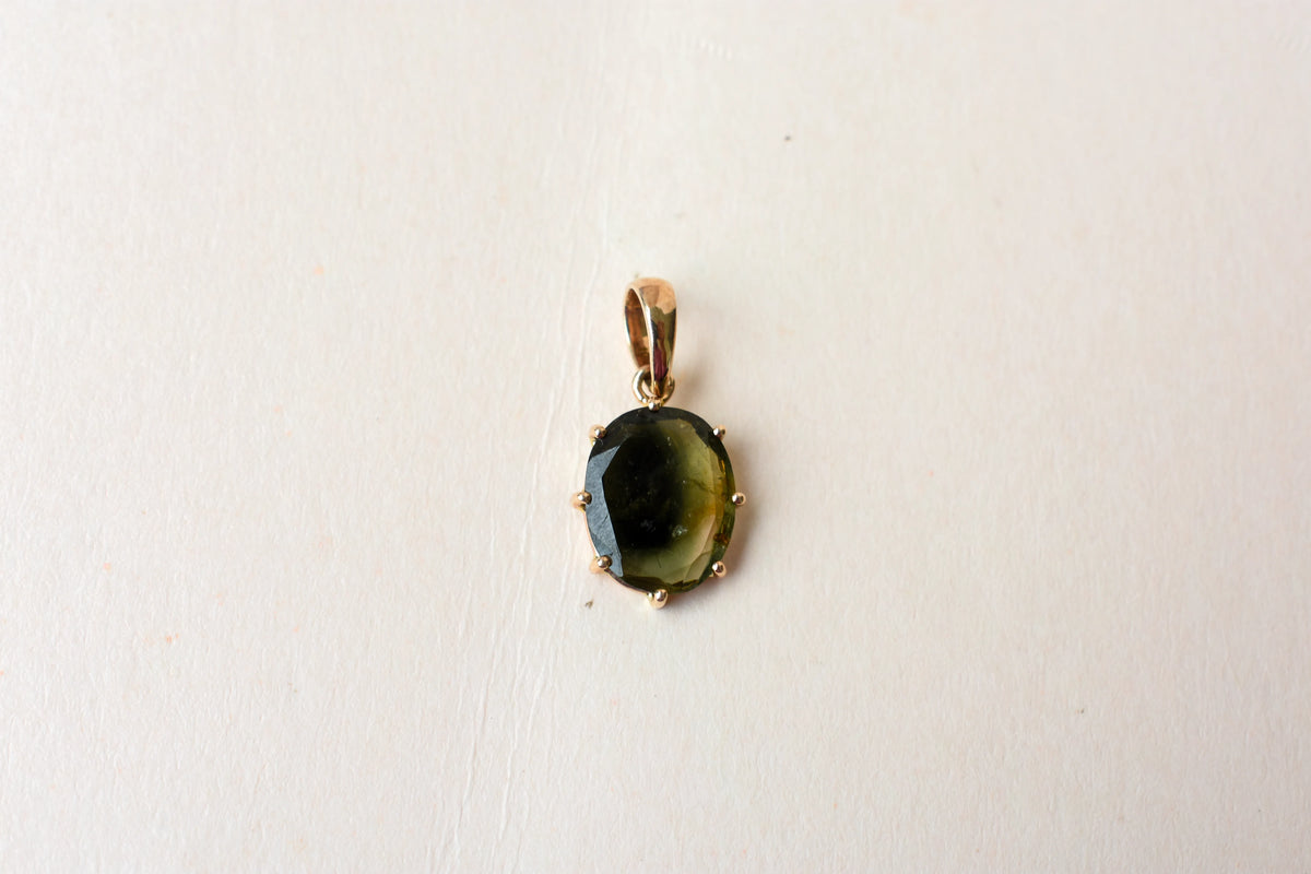 10K gold pendant with oval bi-color tourmaline