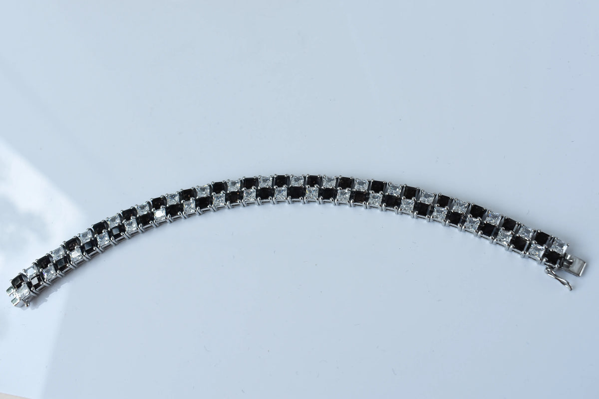 Black and white checkerboard tennis bracelet in silver
