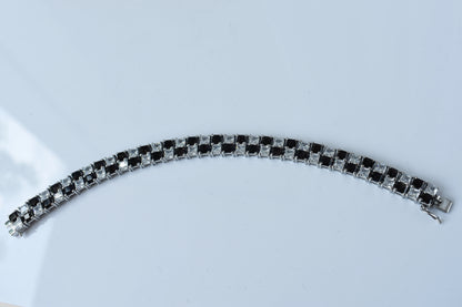 Black and white checkerboard tennis bracelet in silver